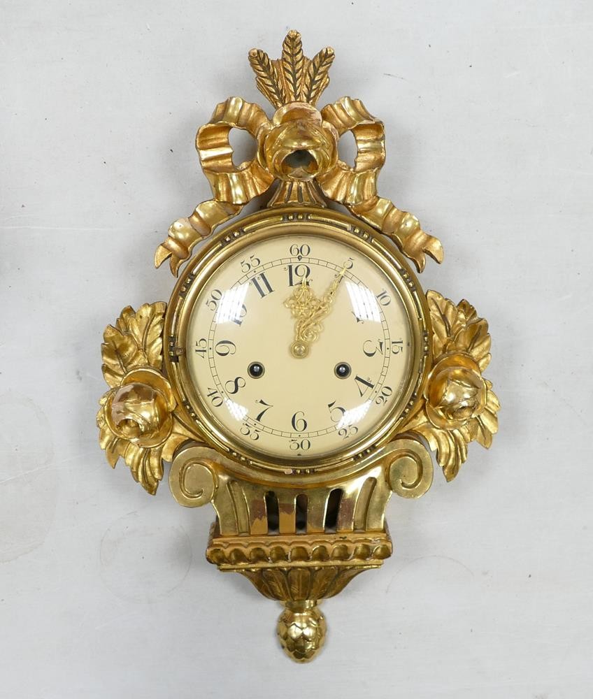 Continental gilt Rococo style pendulum wall clock, some missing gilt area around flower bud