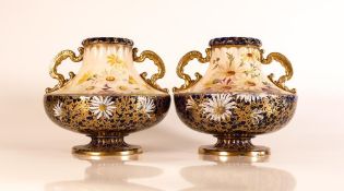 Carlton ware Wiltshaw & Robinson Ivory Blushware twin handled squat vases in the Daisy pattern. Flow