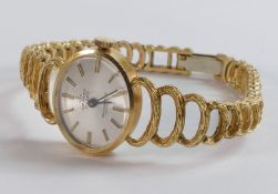 Grintex 18ct hallmarked gold wrist watch and heavy 18ct gold integral bracelet. Dial indicates 17