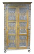 High quality carved Oak hall robe measuring 112cm wide x 195cm high x 45cm deep.