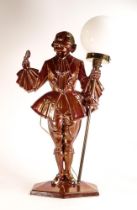 Early 20th century Copper lustred Art Deco lamp in the form of an Dandy in 18th century dress.