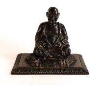 Early Bronze model of a seated Buddha on cushion base, 13cm x 8.5cm x h.10.5cm.