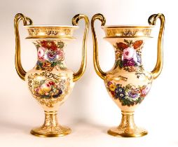 A large and impressive pair of Copeland & Garrett two handled gilded vases, hand painted all over