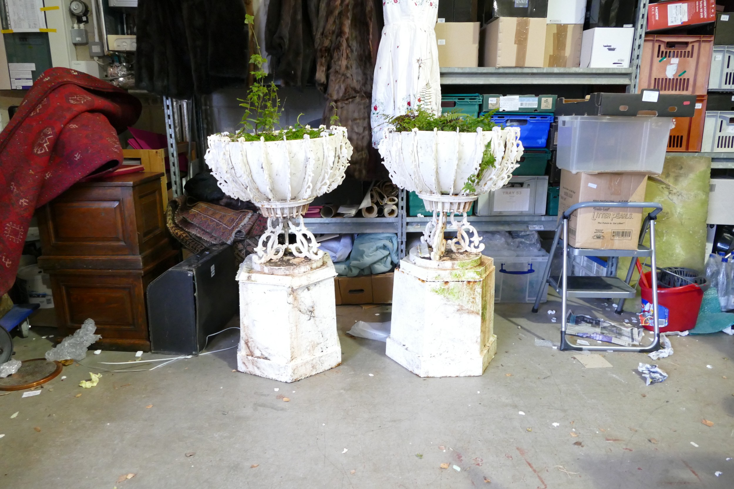 Pair of Arts & Crafts unusual garden planters, cast iron bases and architectural metal upper