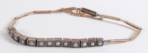 High carat gold bracelet set 13 diamonds, not hallmarked but tested as higher carat gold. Diamonds