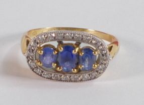 18ct gold ladies ring set with three oval sapphires and oval set diamond cluster, ring size P, 5.3g.