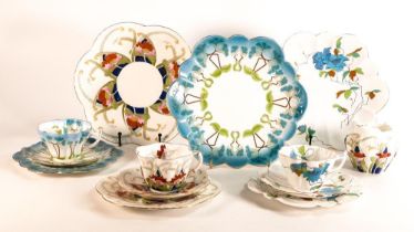 Wileman & Co trios together with bread and butter plates x 3, milk jug. Consisting of Snowdrop