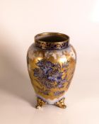 Carlton ware Wiltshaw & Robinson three footed vase in a Flow blue floral design with raised gilt