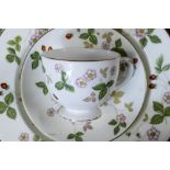 A collection of Wedgwood Wild Strawberry pattern tea & dinner ware to include tea pots, 7 x