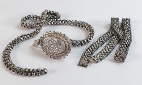 Victorian silver locket and necklace and a silver necklace, 74g. (2)