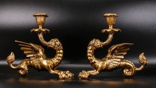 Pair of gilt Bronze antique candleholders in the form of Chimeras, height 16cm (2)
