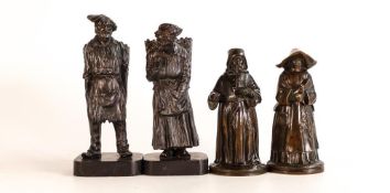 Four 19th century Bronze figures to include a Monk and Nun pair of table vestas possibly Eastern