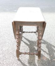 18th century Oak drop leaf table, with bobbin turned supports, w.159cm x h.78 x L.126cm.