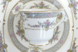 A collection of Minton Persian Rose tea and dinnerware, including tea set, large platters,