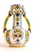 Fourmaintraux Factory, French Faience twin handled vase, decorated in stylised floral and foliate