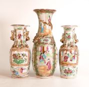 Three Cantonese porcelain Famille Rose Baluster vases decorated in polychrome enamels and gilt