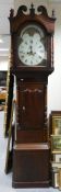 Mahogany cased longcase clock with painted arch dial and rolling moon. Hole in side of case &