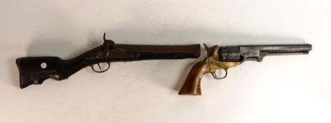 Two Pistols consisting of a cap gun as a Colt Navy Percussion Revolver and a George III style
