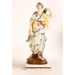 Early 19th century Pearlware figure of Diana of the Hunt. Modelled with bow in hand and reaching for