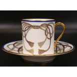 De Lamerie Fine Bone China heavily gilded Ribbons & Bows pattern in blue set of six coffee cans &