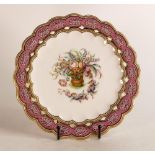 Coalport hand painted reticulated plate. Painted with floral arrangement in a rattan style vase.