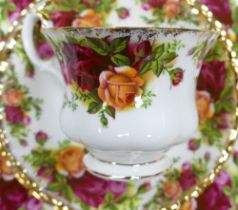 A large collecction of Royal Albert Old Country Roses pattern tea & dinner ware to include 8 x