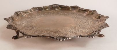Silver salver hallmarked for London 1766, family coat of arms to centre, d.31cm, 752g.
