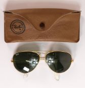 Vintage pair of cased Ray-ban Aviator sunglasses, BL mark noted to lens.