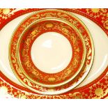 A collection of De Lamerie Fine Bone China heavily gilded Renaissance pattern dinnerware - three