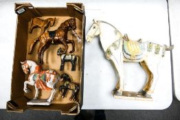 A collection of Pottery, wooden & similar decorative horse figures including large Tang style item