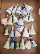 A collection of 23 small Wade Lady figures (1 tray)