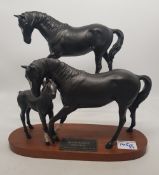 Beswick black beauty and foal on wooden plinth together with black beauty