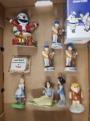 A collection of Wade figures to include Felix Christmas Surprise, 3 Sailor Bibendum figures, Snow