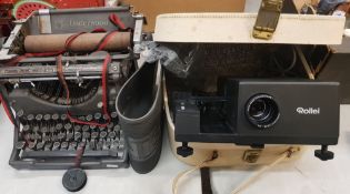 Vintage Underwood manual typewriter together with a Rollei branded slide projector (2).