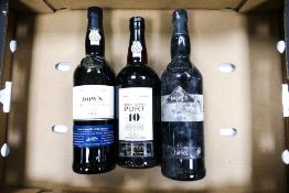Three Bottles of Vintage Port to include Dows Renown Port, Oporto Aged Tawny Port etc