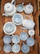 A Wedgewood Queensware Tea Ware to Include 9 Teacups, 6 Saucers, 6 Side Plates, Milk Jug, Lidded