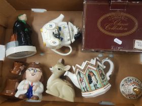 A collection of Wade items to include Handicapp Money Box, tetley tea money box, Bambi Money box,