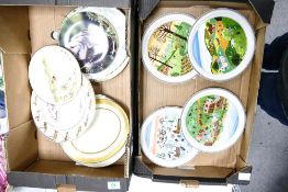 A large collection of decorative wall plates including Villeroy & Boch Seasons plates, Royal Doulton