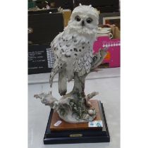 A Guiseppe Armani Statue of a Snowy Owl. Overall Height 35cm