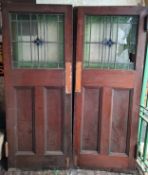 A Set of Victorian Double Doors, with fitted and Stained Glass Panelling. One Glass Panel has