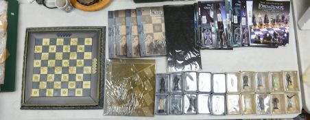 Large collection of Boxed Lord of The Rings Chess pieces with mostly matching Magazines, Binders,