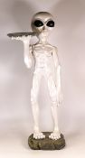 Alien figure holding ashtray, height 66cm
