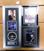 A collection of James Bond themed items to include movie print, film cell (cert present) and