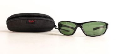 A pair of ray-Ban sunglasses, model 9806, with case