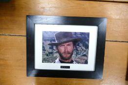 Clint Eastwood signed print, H40 L50 (cert inside frame)