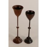 High quality treen turned rosewood stemmed cups of unknown origin, age or use. Largest 15cm high.