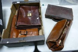 A mixed collection of items to include Leather Gladstone Bag, distresses leather case & similar