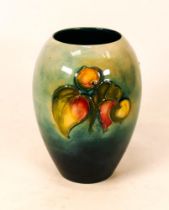 Moorcroft Clematis vase on green / blue background. Height 13cm