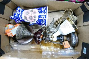 A mixed collection of items to include ceramic jug, Wade Bell's whiskey decanter, metal swan, oil