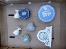 A collection of Wedgwood items to include Wild Strawberry mantle clock, jasperware lidded boxes &
